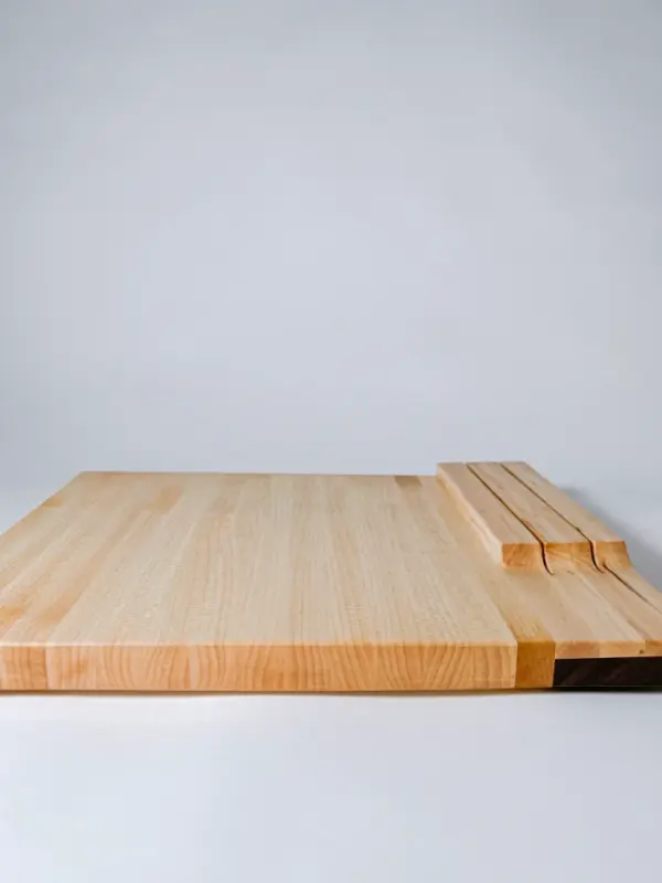 Maple edge grain cutting board with knife storage
