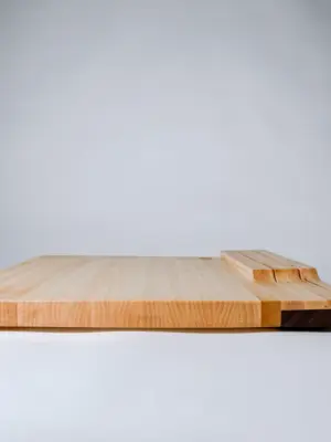 Maple edge grain cutting board with knife storage