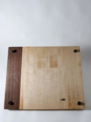Maple edge grain cutting board with knife storage