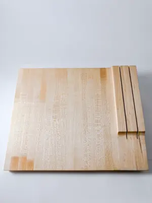 Maple edge grain cutting board with knife storage