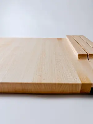 Maple edge grain cutting board with knife storage