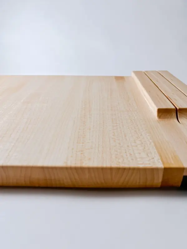 Maple edge grain cutting board with knife storage