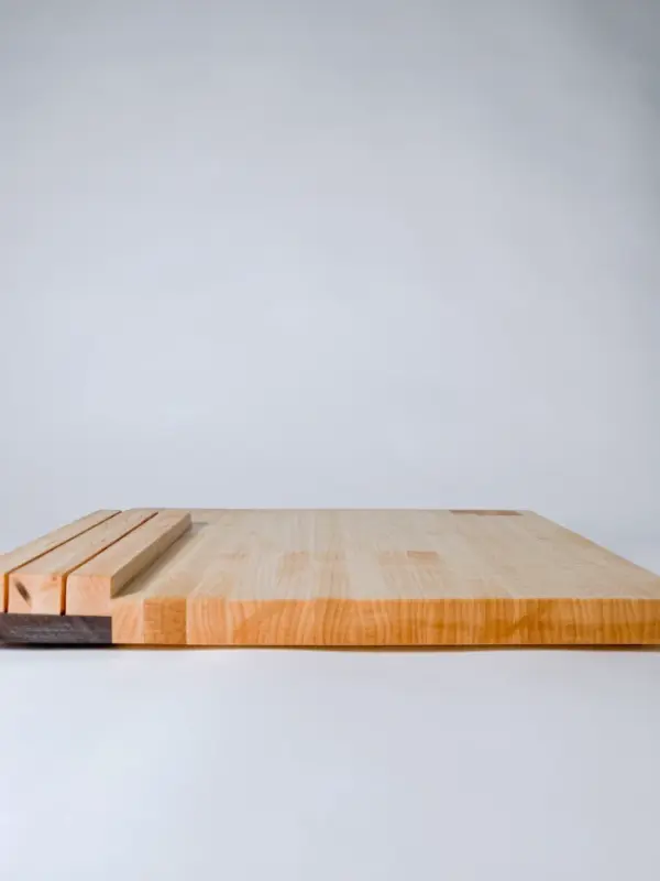 Maple edge grain cutting board with knife storage