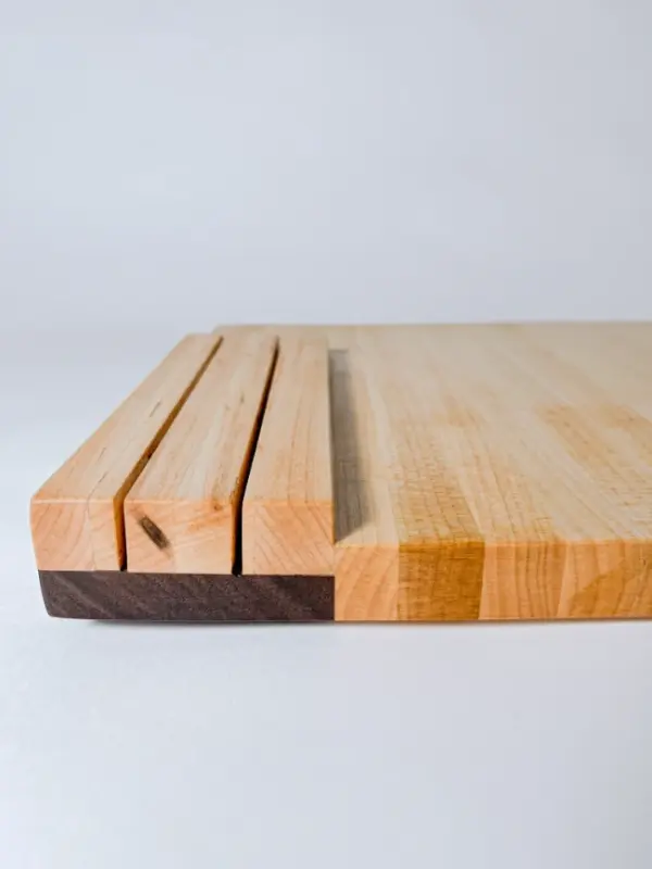 Maple edge grain cutting board with knife storage