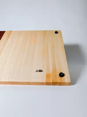 Maple edge grain cutting board with knife storage