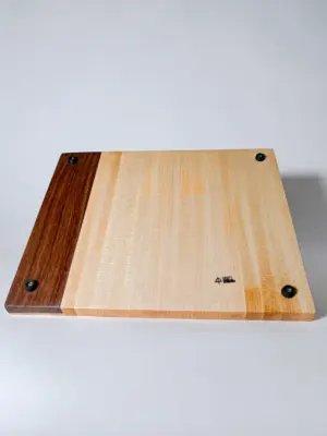 Maple edge grain cutting board with knife storage