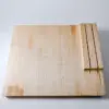 Maple edge grain cutting board with knife storage