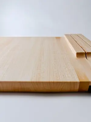 Maple edge grain cutting board with knife storage