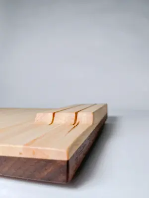 Maple edge grain cutting board with knife storage