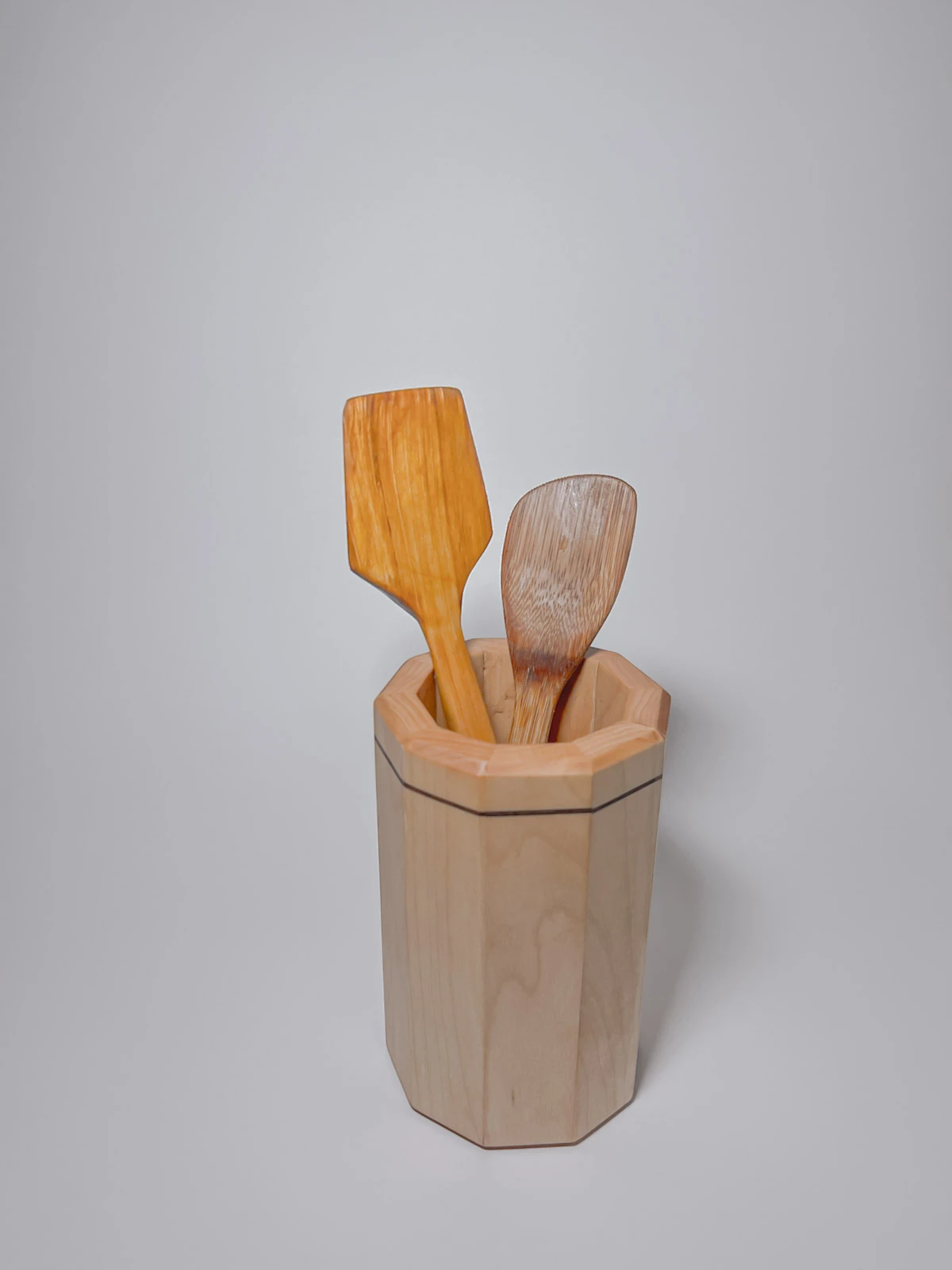 Maple wood kitchen utensil holder with walnut strip Maple wood kitchen utensil holder with walnut strip with wooden utensils