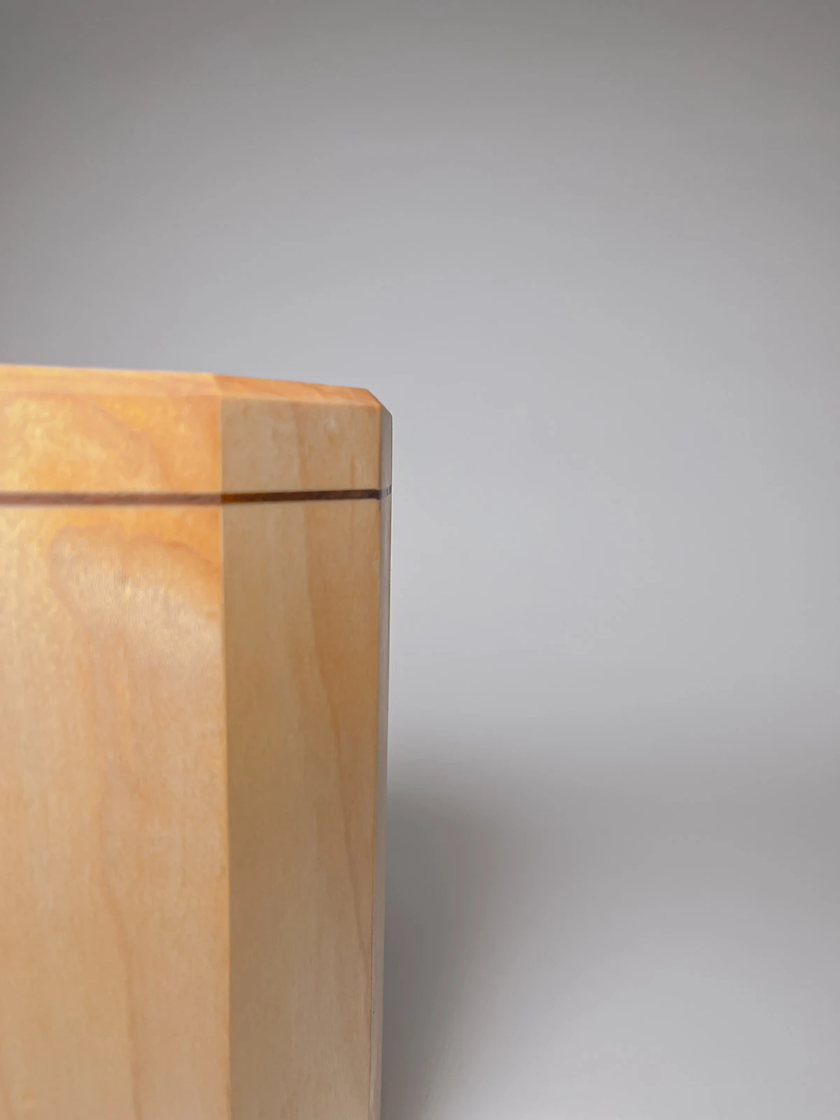 Maple wood kitchen utensil holder with walnut strip Maple wood kitchen utensil holder with walnut strip close up view