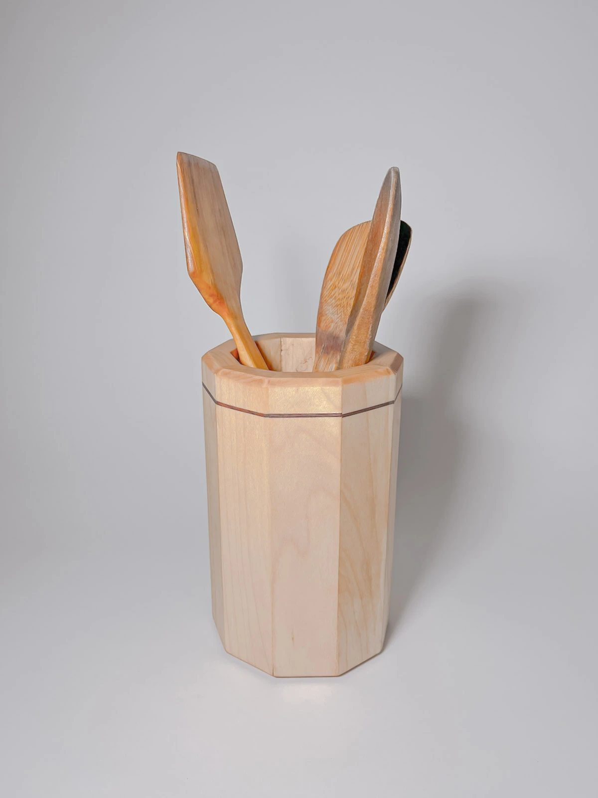 Maple wood kitchen utensil holder with walnut strip Maple wood kitchen utensil holder with walnut strip with wooden utensils