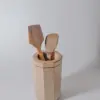 Maple wood kitchen utensil holder with walnut strip Maple wood kitchen utensil holder with walnut strip with wooden utensils