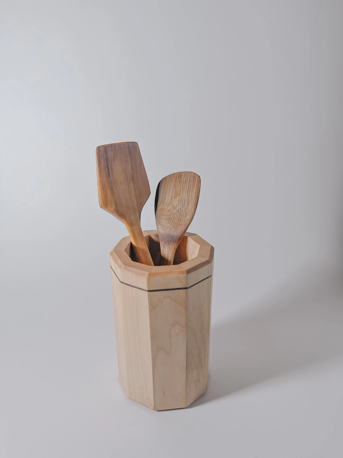 Maple wood kitchen utensil holder with walnut strip Maple wood kitchen utensil holder with walnut strip with wooden utensils