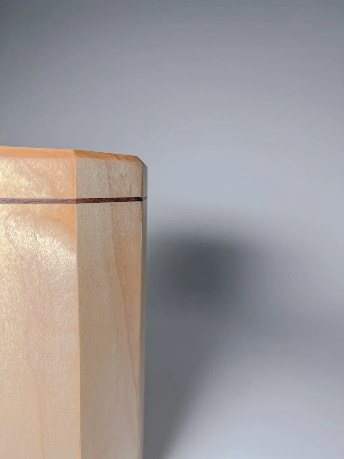 Maple wood kitchen utensil holder with walnut strip Maple wood kitchen utensil holder with walnut strip close up view