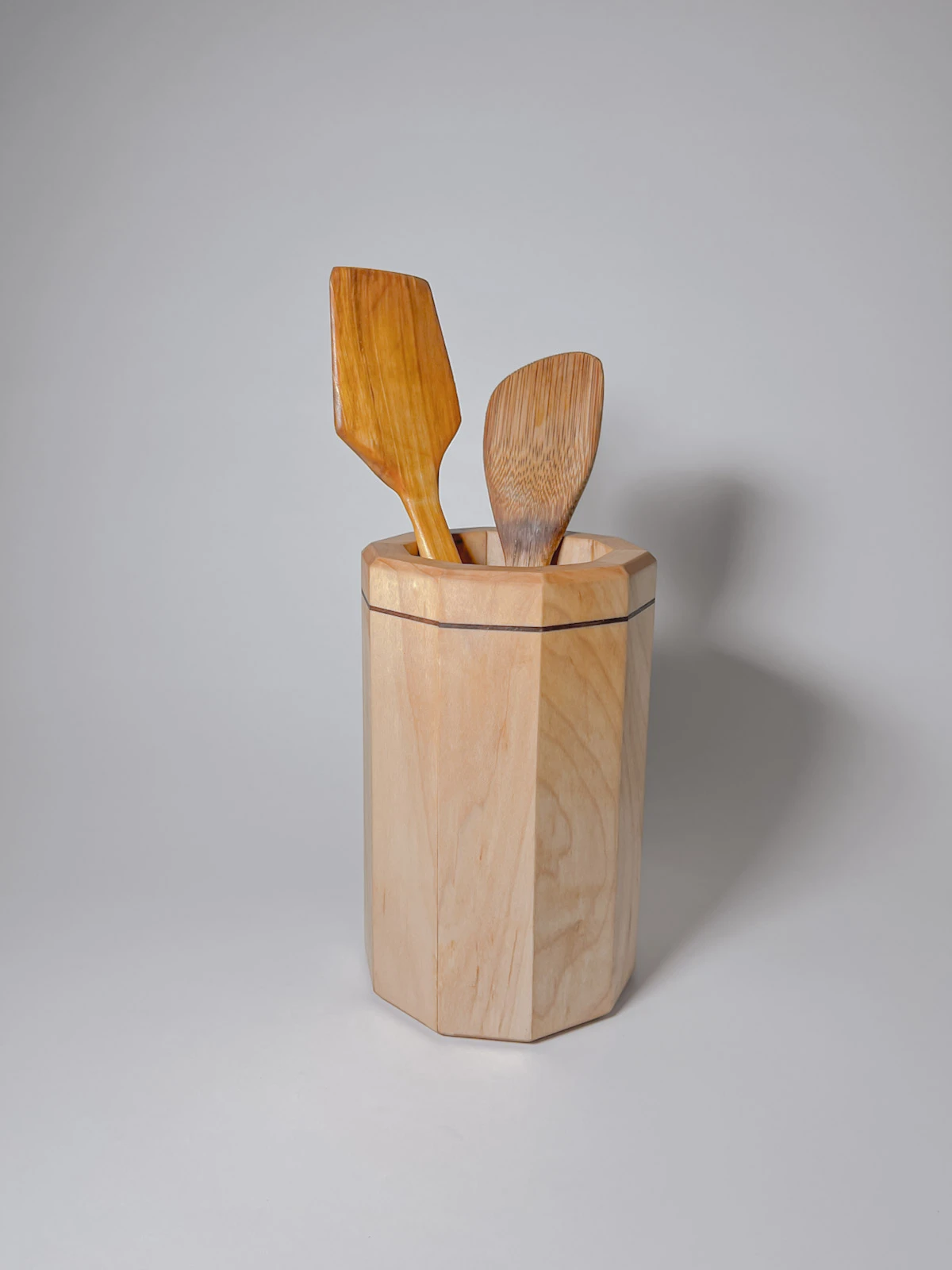 Maple wood kitchen utensil holder with walnut strip Maple wood kitchen utensil holder with walnut strip with wooden utensils