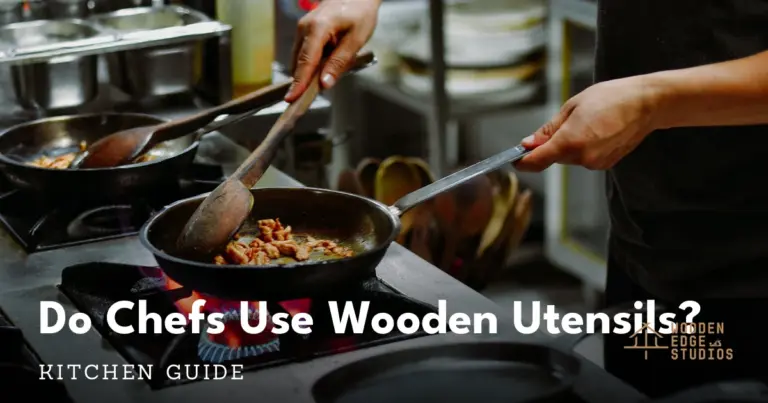 Professional chef stirring with a wooden spoon over a gas flame in a commercial kitchen
